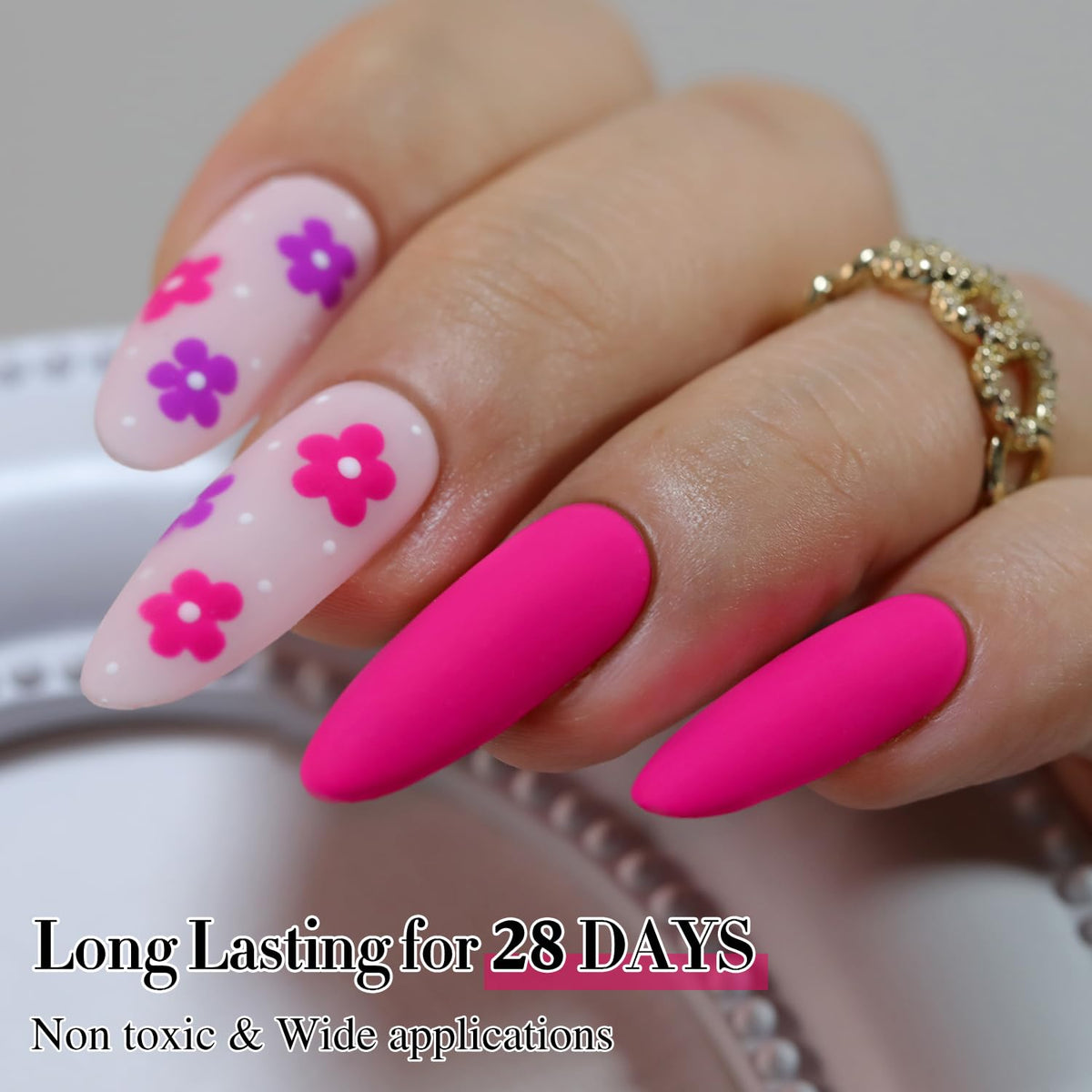 Double Rhythm swatch on hand showing wearable hot pink and glossy finish