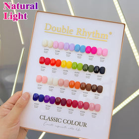 Double Rhythm kit contents laid flat, displays all 24 colors plus base top builder