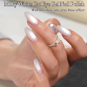 Double Rhythm styled hands on desk showcasing salon-quality nails and wearable everyday style