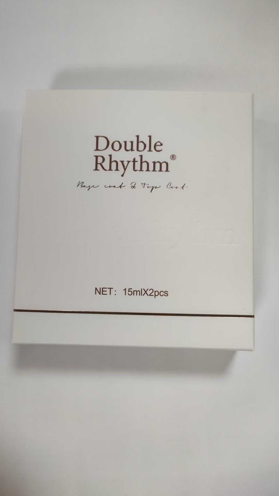 Double Rhythm lifestyle manicure on model hands showing salon-quality look