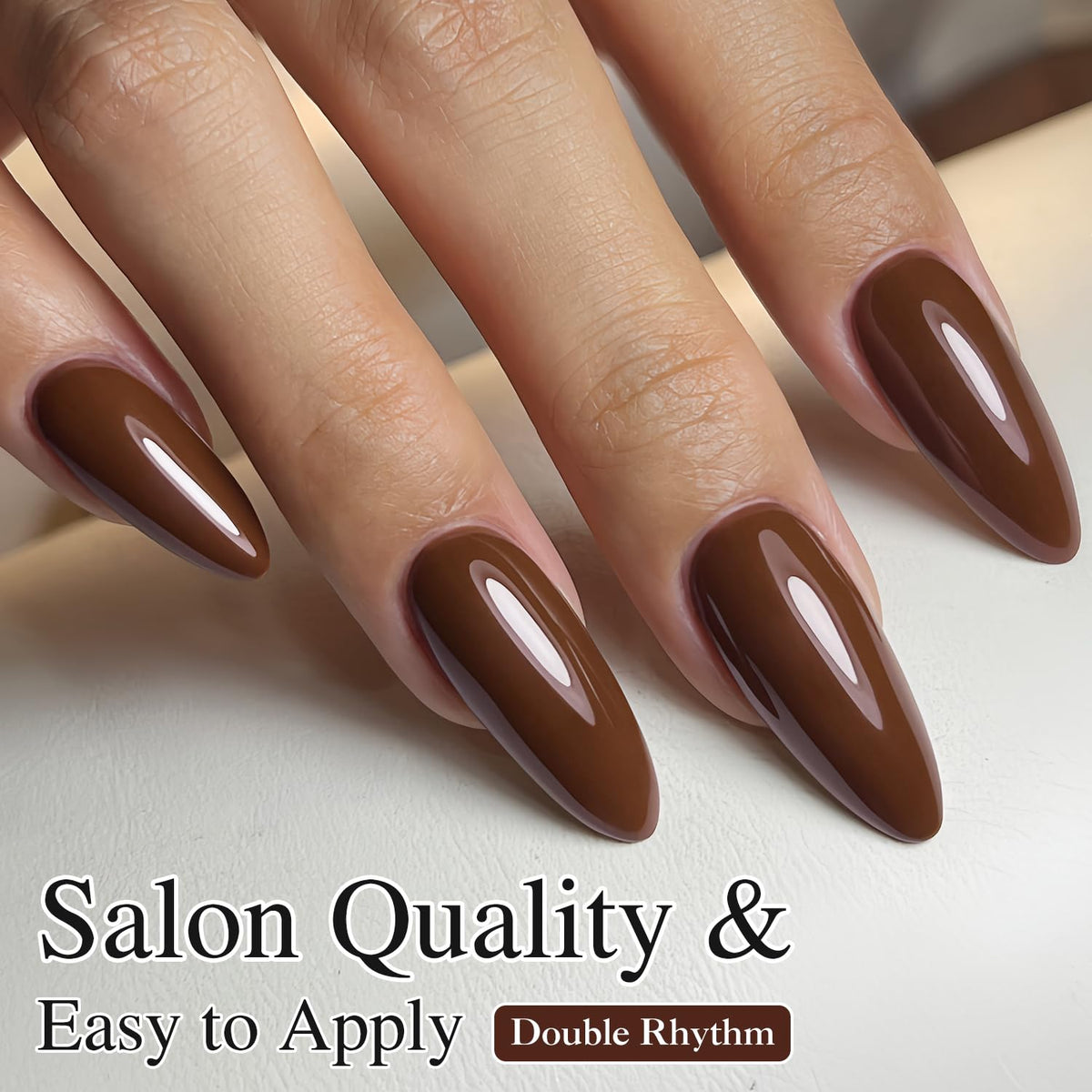 Double Rhythm lifestyle shot of woman wearing deep brown nails for polished look benefit