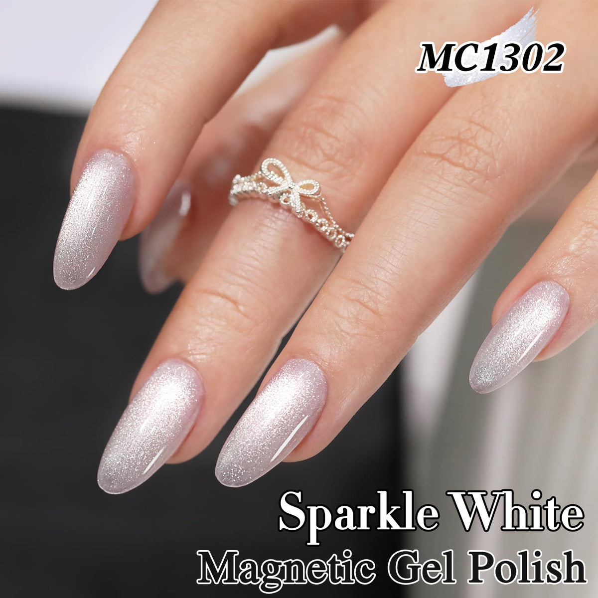 Double Rhythm magnet held above wet polish producing cat-eye stripe for precise nail art benefit