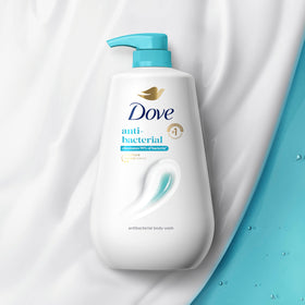 Dove label close-up highlighting Moisture Renew Blend and ingredient transparency benefit