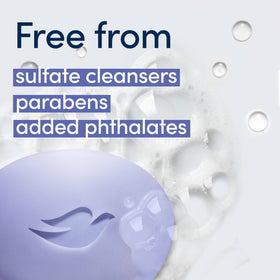Dove bar lathering on skin in shower showing soothing cleanse without dryness