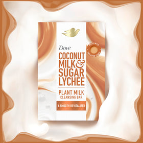 Dove plant milk ingredients arrangement photo conveying natural, skin-friendly formulation