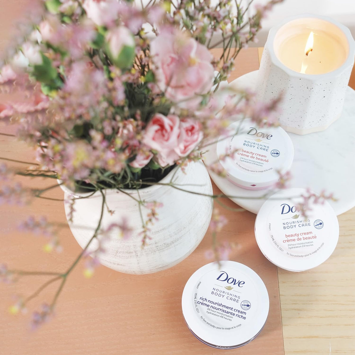 Dove jars inside travel pouch illustrating TSA-friendly convenience