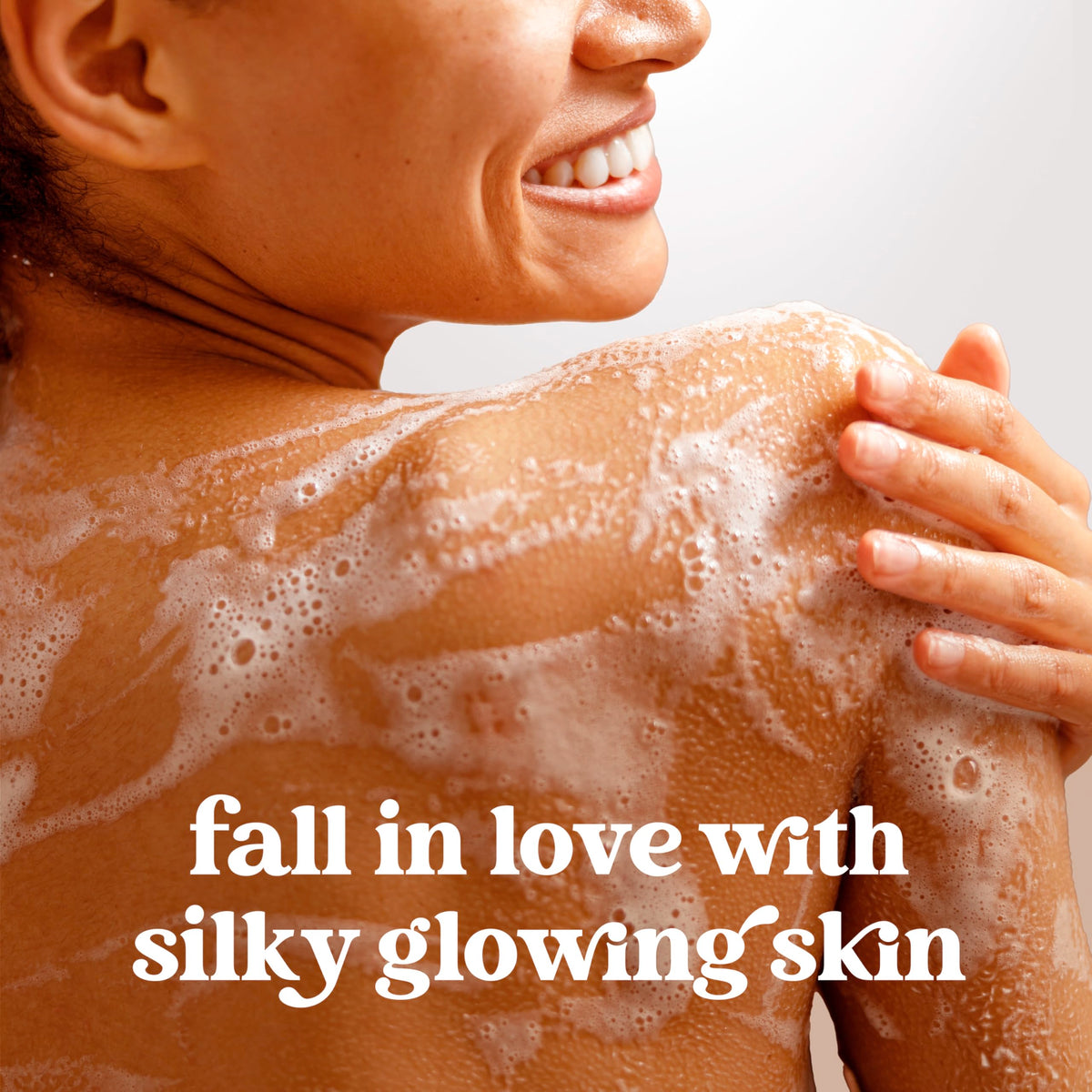 Dove creamy lather closeup demonstrating moisturizing cushion on skin