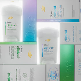 Someone applying Dove Clinical + Care stick for quick and lasting protection
