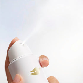 Dove 3.8 oz can next to measuring tape for size and travel convenience benefit