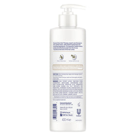 Dove conditioner cream texture demonstrating rich moisturization
