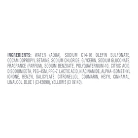 Person after wash using Dove showing lightweight hair and refreshed scalp appearance