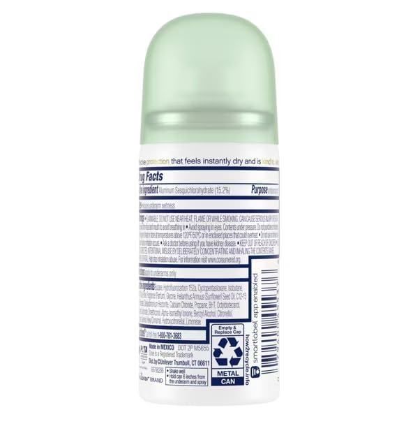 Dove travel dry spray in hand illustrating portable size and on-the-go convenience