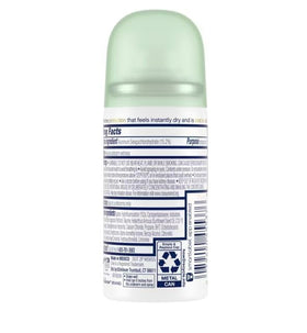 Dove travel dry spray in hand illustrating portable size and on-the-go convenience