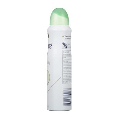 Dove dry spray near folded clothing showing minimal-transfer and fabric-safe benefit