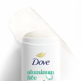 Dove ginger lime held in hand for size comparison and convenience benefit