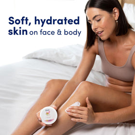 Dove hands after application showing non-greasy, hydrated skin