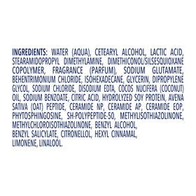 Dove 12 oz bottle held in hand to show true size and travel convenience