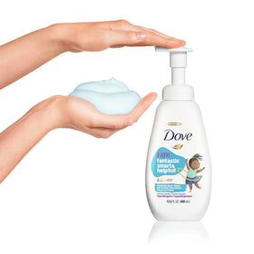 Dove kids bottle in hand size comparison demonstrating convenient pump use and portability