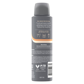 DOVE MEN + CARE close up of spray nozzle and cedar shea label benefits