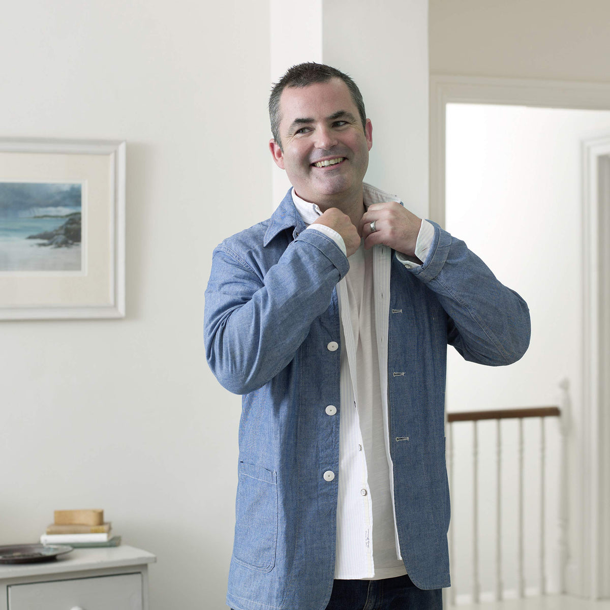 Dove Men+Care deodorant in hand displaying 3 oz size for travel convenience