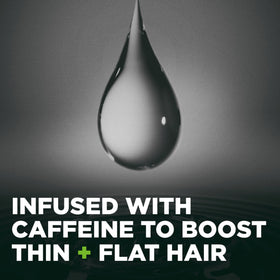 Close-up of Dove Men+Care label highlighting caffeine-infused, alcohol-free ingredients