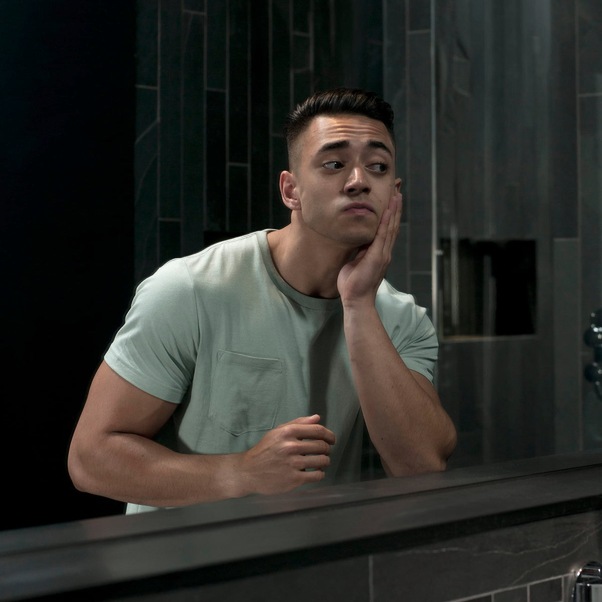 DOVE MEN + CARE lifestyle on bathroom counter with citrus and cedar accents