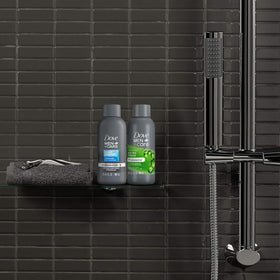 Dove Men+Care bottles staged on bathroom shelf showing everyday grooming benefit