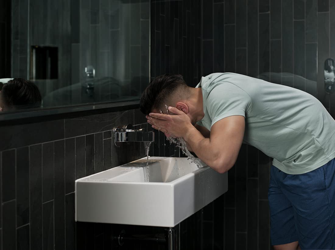 DOVE MEN + CARE on shower shelf lifestyle shot emphasizing daily use readiness
