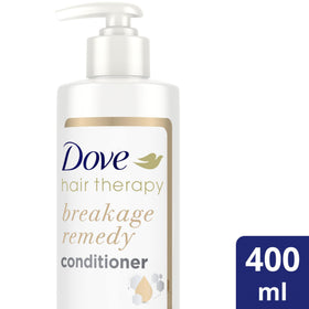 Dove label close-up highlighting nutrient-lock serum for hair