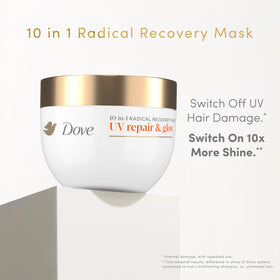 Dove mask being applied to damp hair in shower for quick repair benefit