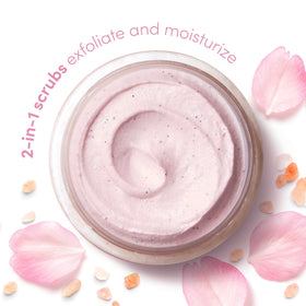 Dove scrub in hand being applied for softening and smoothing skin benefit