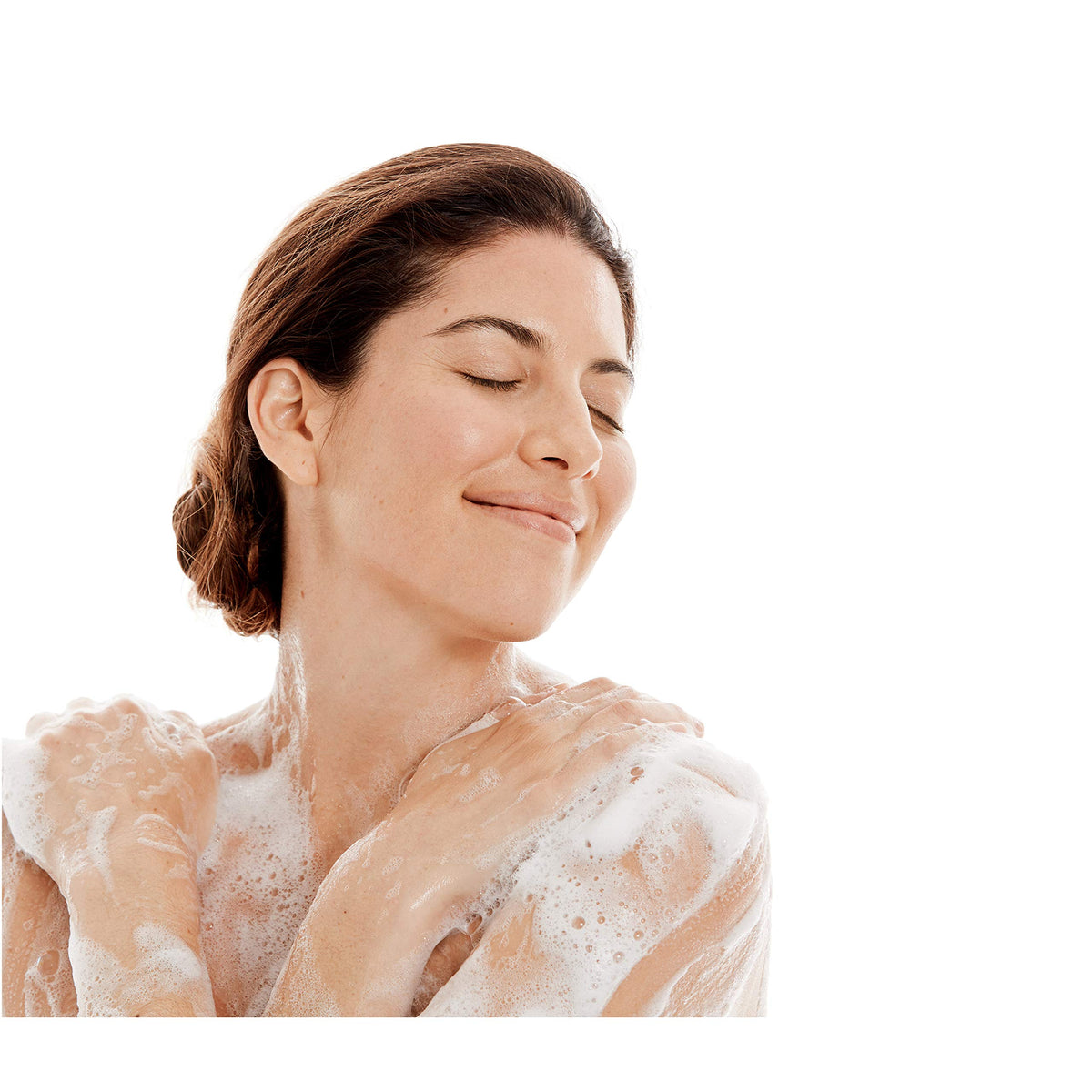 Dove body wash on bathroom shelf conveying everyday lifestyle convenience