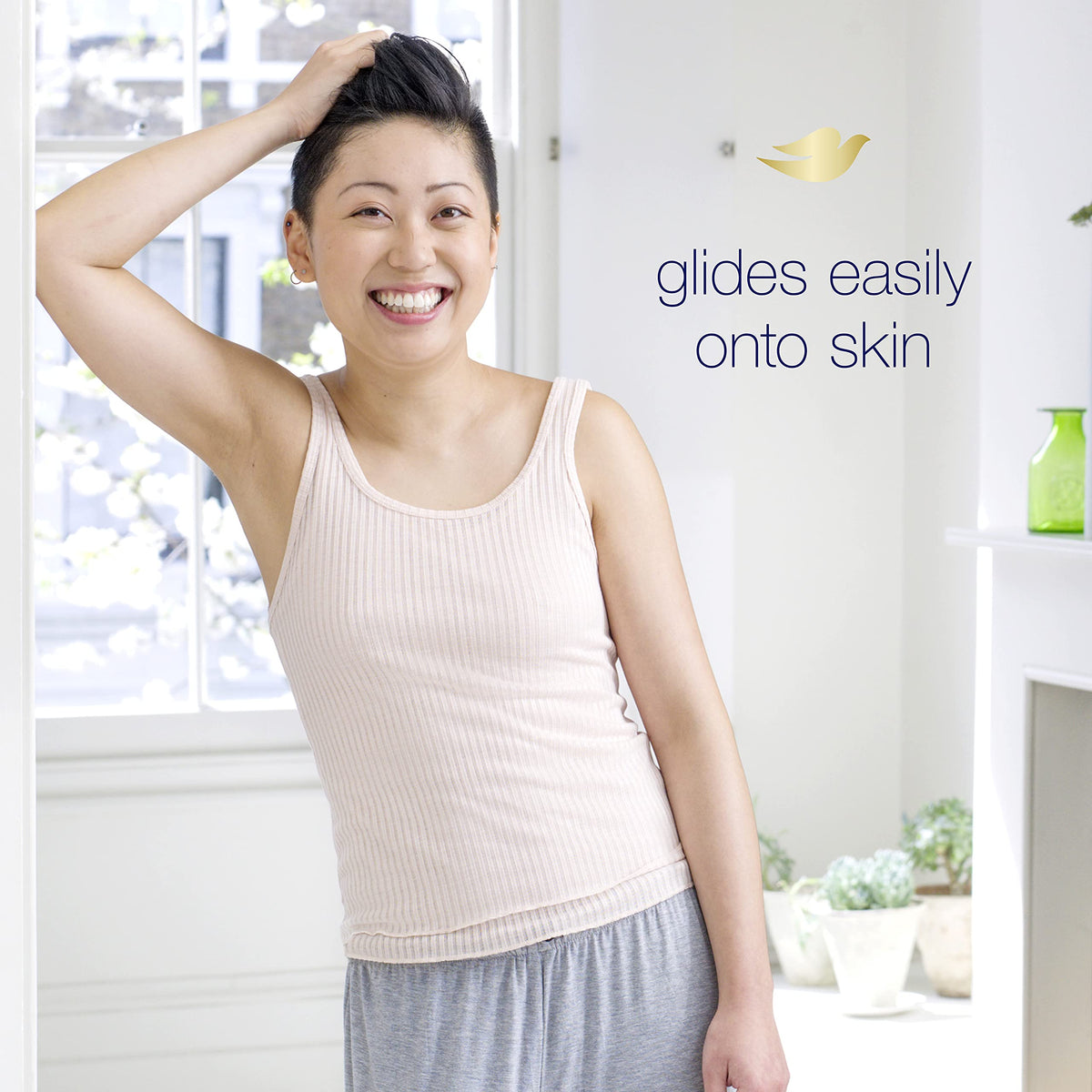 Dove antiperspirant stick in use applying to underarm for quick, gentle protection