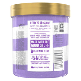 Open tub texture of Dove sugar scrub revealing creamy rice milk consistency and moisturizing feel
