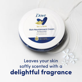 Dove travel jars arranged on desk for easy on-the-go moisturization