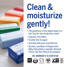 Dr. Bronner's bars in hand for scale showing compact 5 ounce size benefit