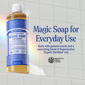 Dr. Bronner's peppermint soap being poured and lathered for versatile cleaning
