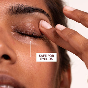 Dr Dennis Gross bottle beside ingredient list card highlighting active ferulic and retinoid content
