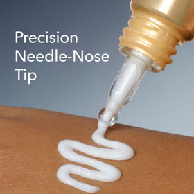 Dr Dennis Gross tapping application on hand demonstrating lightweight finish