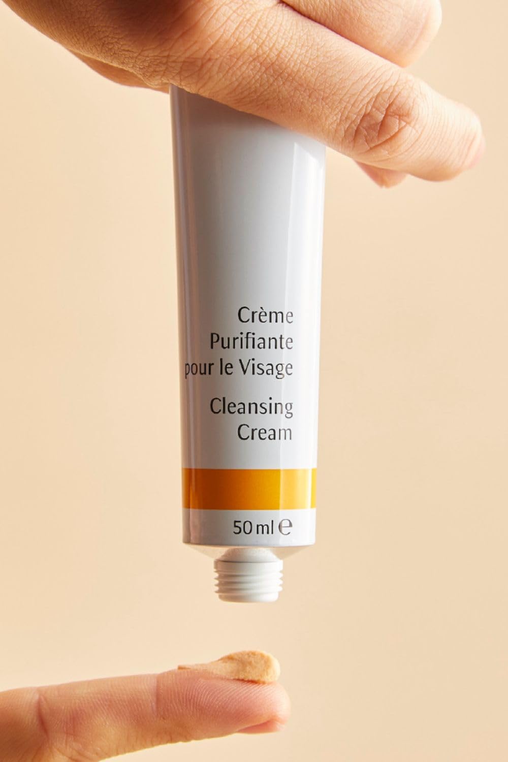 Dr. Hauschka cleansing cream dispenser detail highlighting controlled application