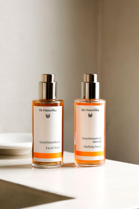 Dr. Hauschka toner on bathroom counter in routine setting for calming prep