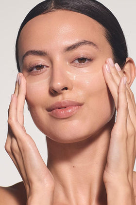 Dr. Hauschka product applied on hand demonstrating lightweight feel and blendability