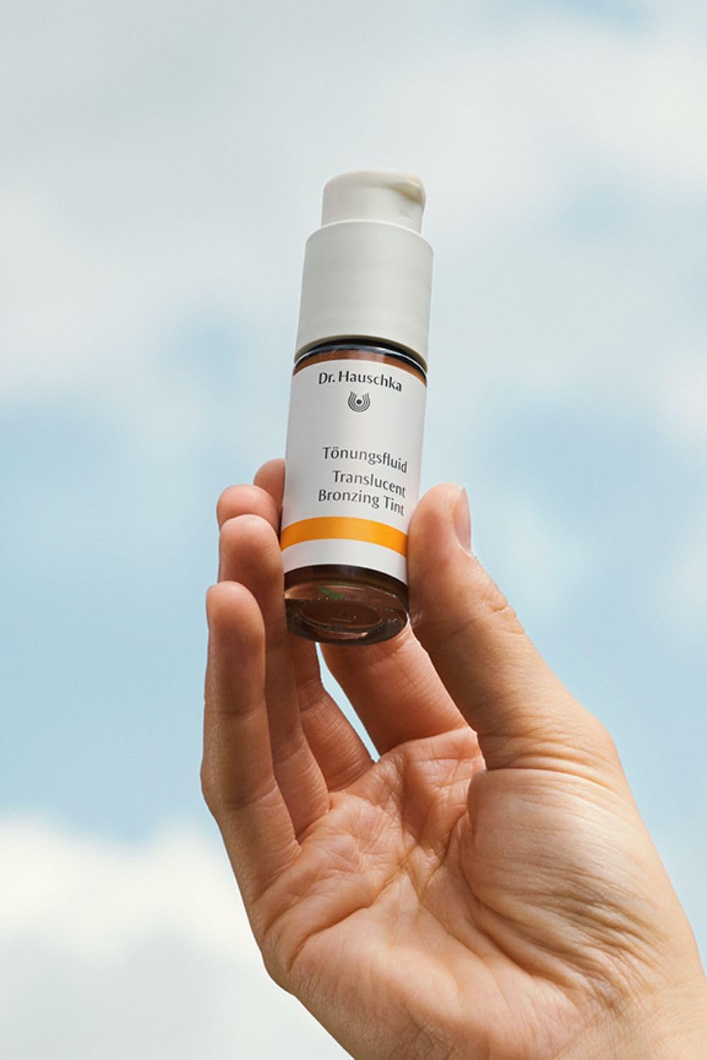 Dr. Hauschka bottle label close-up showing ingredients and natural formulation benefit