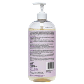 Dr. Natural bottle in a serene bathroom scene evoking calm lavender scent