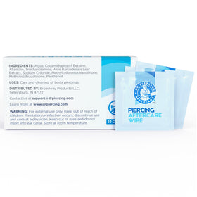 Dr. Piercing Aftercare pocket pack in a small bag illustrating on-the-go piercing aftercare