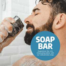Dr. Squatch bar held in a hand showing 5 oz size for scale and long-lasting use