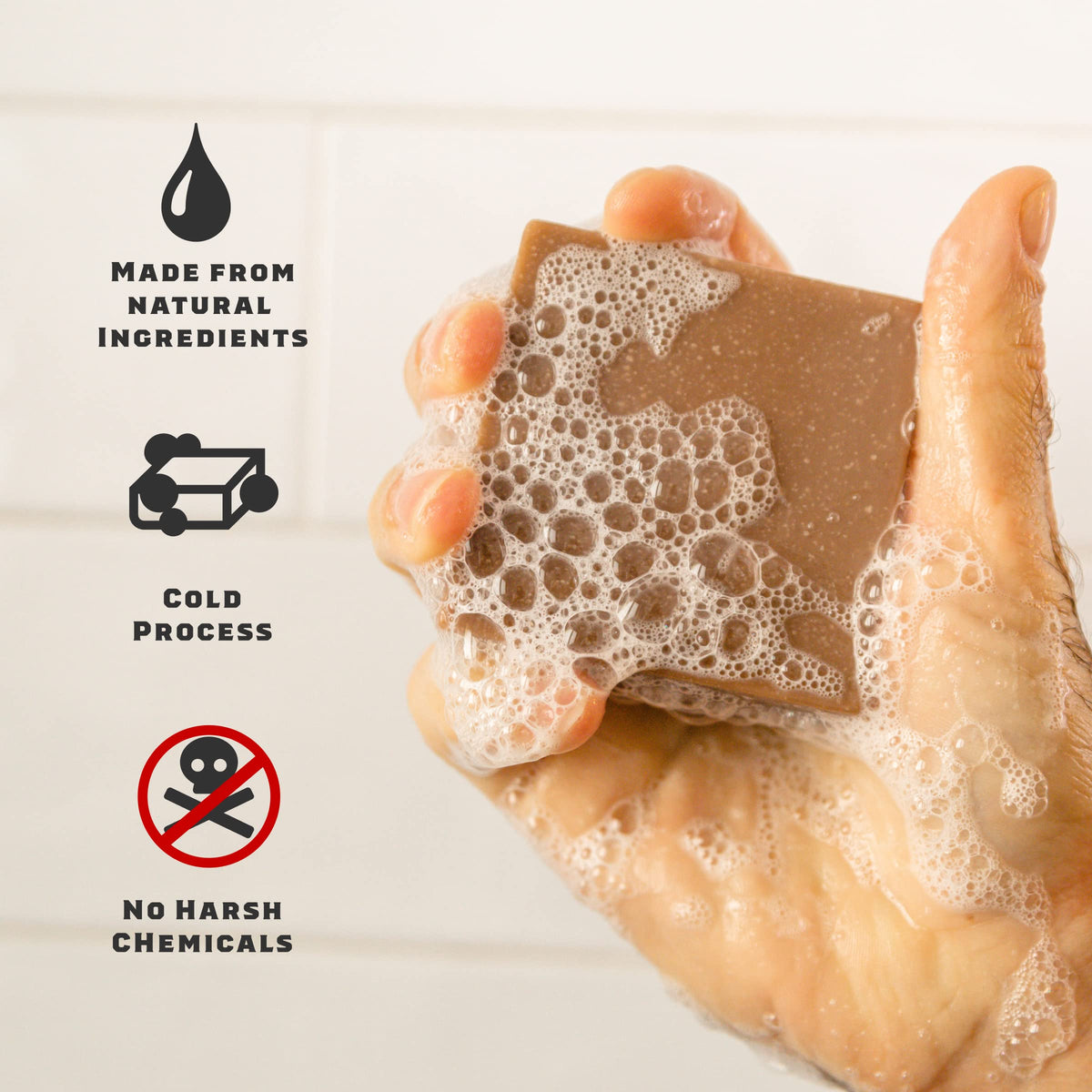 Dr. Squatch soap in hand for size comparison and easy daily use