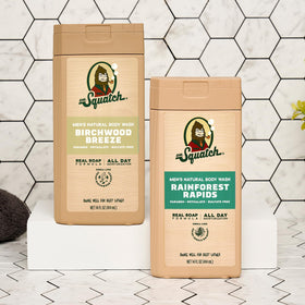 Dr. Squatch pouring into hand with water showing easy rinse benefit