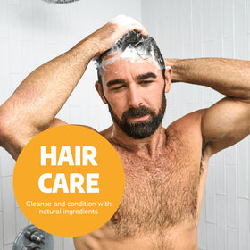 Dr. Squatch shampoo lather on hands demonstrating gentle cleansing