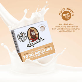 Dr. Squatch Shea Butter bar held in hand demonstrating rich emollient feel